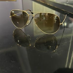 Ray-Bans gold tone frames with brown lenses💃🏻🌺